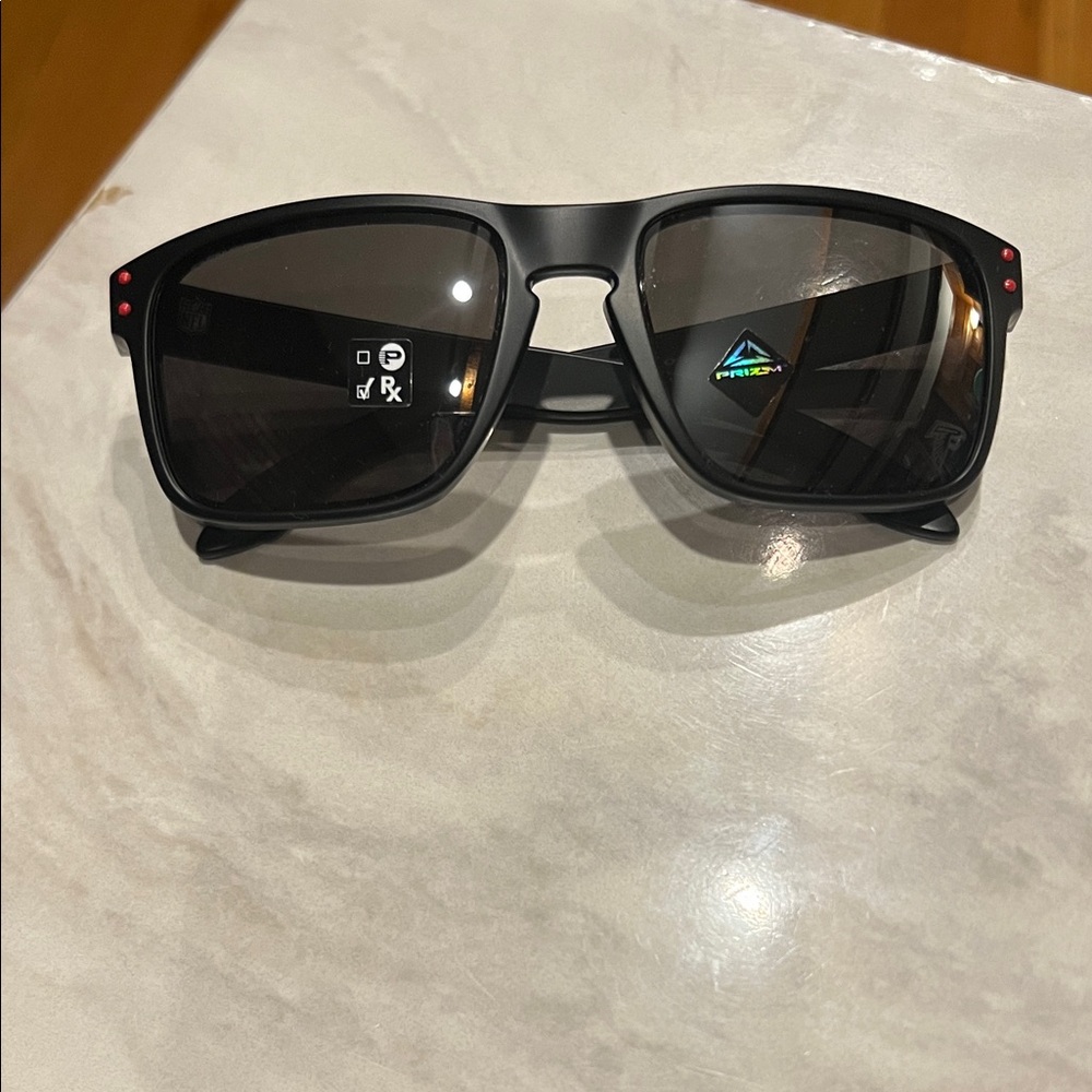 Official Oakley NFL Falcons Holbrook Black Sunglasses with Red Accents